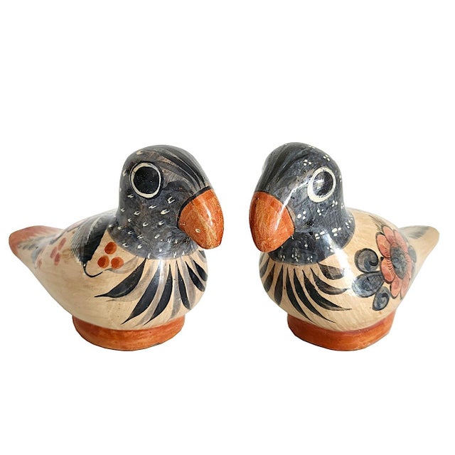 Offered is a set of 2 hand-painted and burnished glaze vintage 1960s bird (toucans?) figurines made in Tonalá, Jalisco...