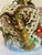 Here is a wonderfully elaborate later mid-century Chinese porcelain sculpture featuring an openwork basket surrounded by...