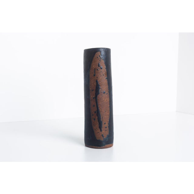 Tall Tar Glazed over Bisque Ceramic Vase Signed 9" tall 2.50"diameter Condition very good original condition