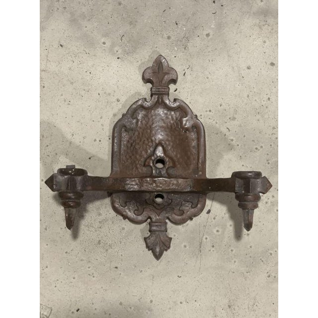 Antique Tudor 2 Light Wall Sconce Hanmered Gothic Style Fluer de lis for repair the sconce need to be cleaned and re-wired