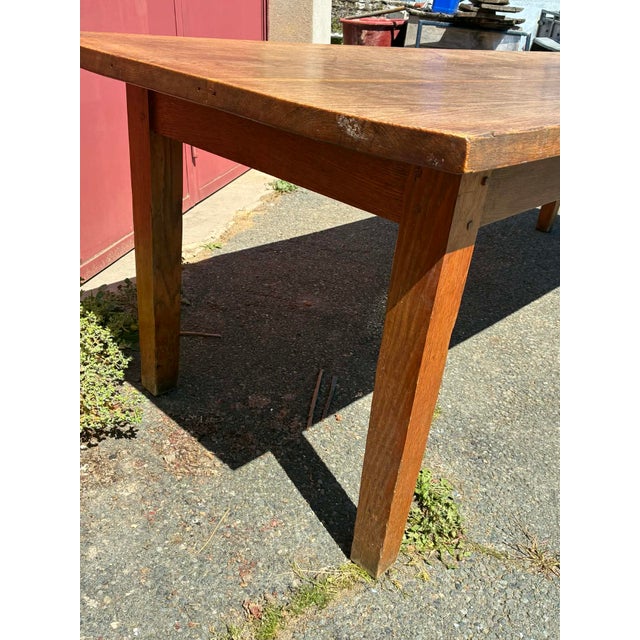 Stunning oak dining table with generous dimensions (2.40m long)! It features a drawer at one end. Perfect for...