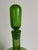 This striking vintage Blenko decanter, designed by renowned American glass artist Joel Philip Myers, is pattern 657M....