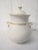 This white jar with a lid and gold detailing is simply stunning. A clever and classy way to store your biscotti.