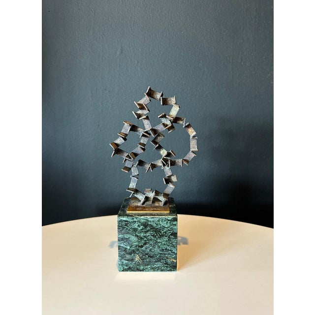 Bronze and marble abstract sculpture by jeweler and sculptor William De Lillo. These works (we have several by De Lillo)...
