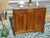This sideboard, made in France in the early 20th century, blends two styles: the geometric lines of Art Deco and the...