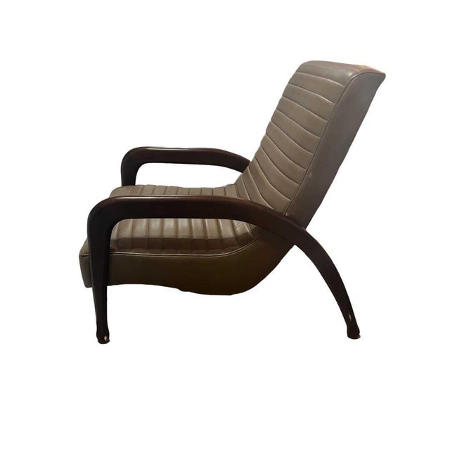Custom made Hancock & Moore mid-century style tan/grey leather chair with walnut arm and leg support. This exceptional...