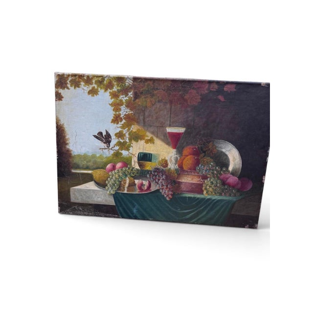 Large early 20th-century European School still life, oil on canvas, depicting an abundant arrangement of grapes, peaches...