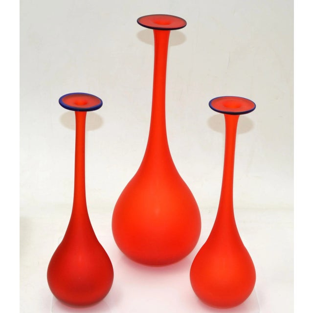 Set of 3 Carlo Moretti Style Mid-Century Modern satin glass bud vases in translucent red with a blue opening. Nesting Set,...