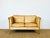 Combining timeless elegance and authenticity, this two-seater sofa captivates with the quality of its materials and the...