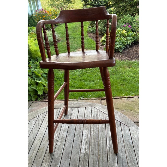 An authentic mid-19th century American continuous-arm child’s Windsor chair, likely made in southeastern Pennsylvania....