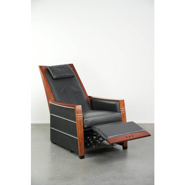 We are offering this luxurious, electrically adjustable Schuitema Art Deco design recliner, model John, from the Decoforma...