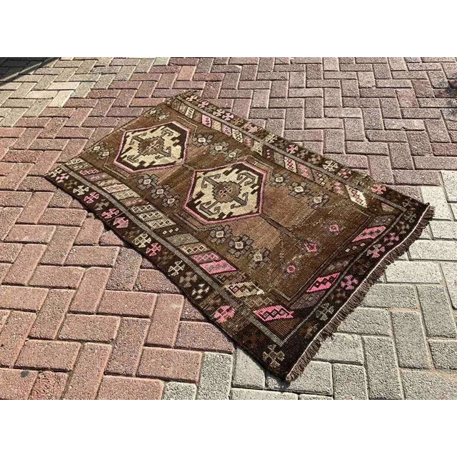 This gorgeous hand knotted area rug was made in 1940's by Anatolian tribals. Collectible rug is made with all hand spun...