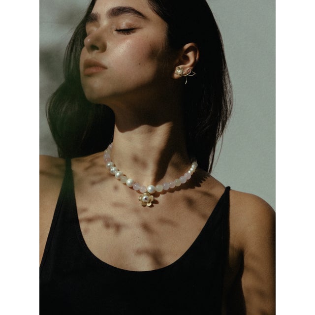 Hand-carved from wax, these daisy-inspired flowers make a great statement while being super lightweight for everyday wear....