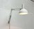 Flexible desk lamp by poulsen, based on a 1972 design. This version is for wall mounting. the it desk lamp is based on the...