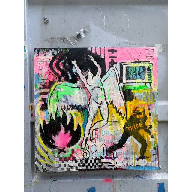 This wild 36x36 acrylic painting on canvas is packed with overlapping images and words. The tale of pop art and palimpsest...