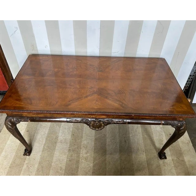 Great quality 18th century Georgian walnut slab table on finely carved cabriole legs terminating in ball and claw feet....