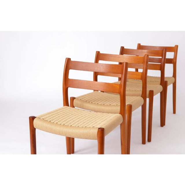Set of 4 Vintage Teak Dining Chairs by Niels Otto Møller – Model 84, Denmark (1970s) This exceptional set of eight Model...