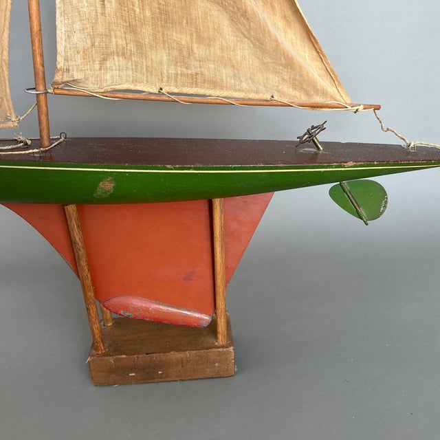 Antique Green Hulled Sailboat With Red Keel and Metal Wheel and Rudder. For Sale - Image 4 of 5