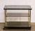 A fine Belgian rectangular three-tier drinks cart (bar cart) or trolley server by Belgochrom, featuring a stylish brass...