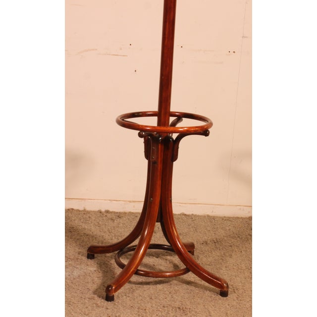 Charming little Thonet-style coat rack in bent beechwood, Art Nouveau style, early 20th century. This beautiful coat rack...