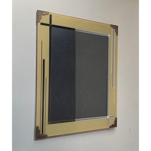 A rare surviver in the shape of this 30x20 cm standing photo frame. It features nickel plated corners and mirror finished...