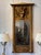 A 19th century giltwood pier mirror, the angular pediment cornice above a rope-twist molding and a tablet mounted with a...