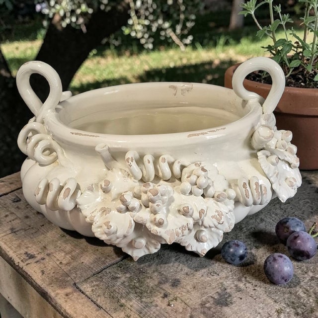 The Tuscan Italian Ceramiche I.M.A Grape Vine Center Piece Bowl Cache Pot Planter is a vintage, hand-painted ceramic bowl...