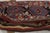 Handwoven in wool circa 1920-1930, this 2x9 Kilim is an antique Russian bag—a collectible textile once used by nomadic...