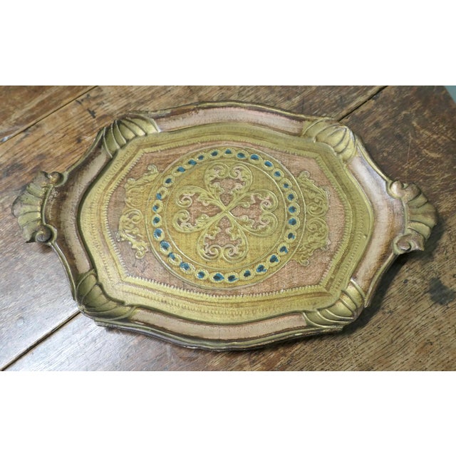 Decorative Carved and Gold Painted Italian Sideboard Tray A very attractive piece decorated in shades of Gold, a rose gold...
