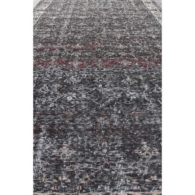 Over dyed in charcoal, cream & grays gallery oushak with all-over floral design. Keivan Woven Arts / rug EN-P13612,...