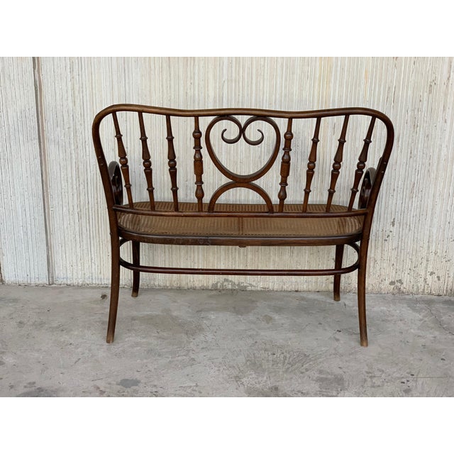 20th century bentwood sofa in the Thonet style, circa 1925, caned seat This sofa it´s very heavy and sturdy.