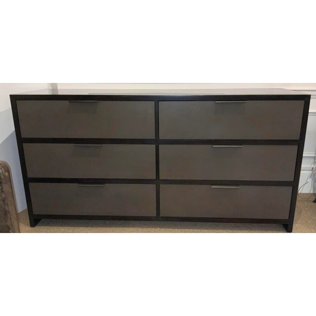 Original retail $3980, stylish Theodore Alexander Modern Bosworth Dresser, lacquered dark walnut finished wood body with...
