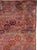 A vintage Afghan Baluch carpet from the second quarter of the 20th century. Measures: 3' 4" x 4' 9"