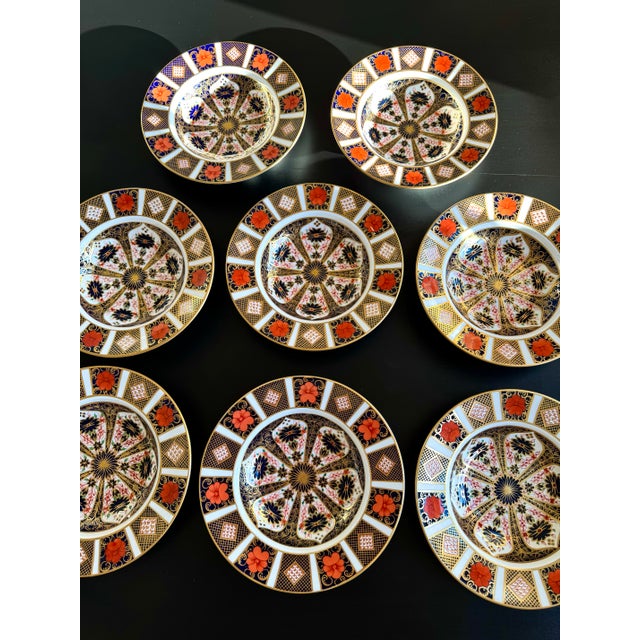 An elegant example of traditional English porcelain, this Royal Crown Derby Old Imari Pattern 1128 rim soup bowl is...