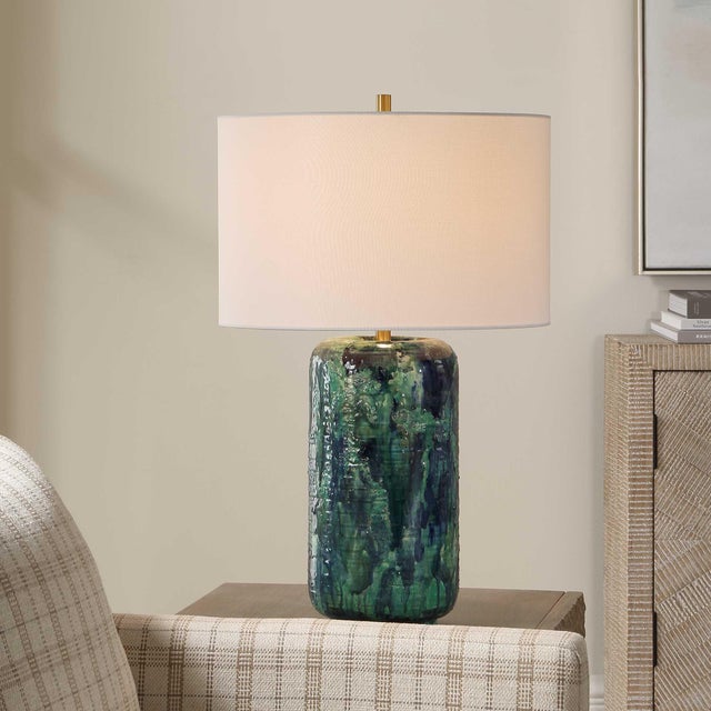 This Artistic Ceramic Table Lamp Features A Cylindrical Base Enhanced By A Captivating Drip Glaze, Presenting A Dynamic...