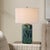 This Artistic Ceramic Table Lamp Features A Cylindrical Base Enhanced By A Captivating Drip Glaze, Presenting A Dynamic...