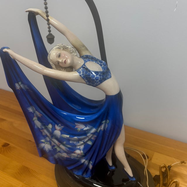 This 1930 Austrian sculpture, lamp designed by Stefon Dakon are highly collectible for their elegant, stylized depictions...