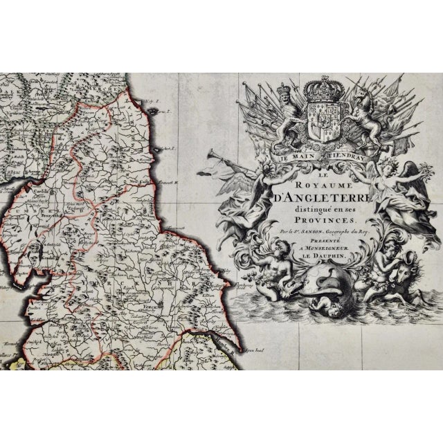 This large hand-colored 17th century copperplate engraved map entitled "Le Royaume D Angleterre, distingué en ses...