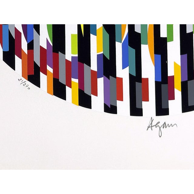 Serigraph on arches paper from Message of Peace portfolio. Hand signed lower front by Yaacov Agam. Hand numbered 21/270...