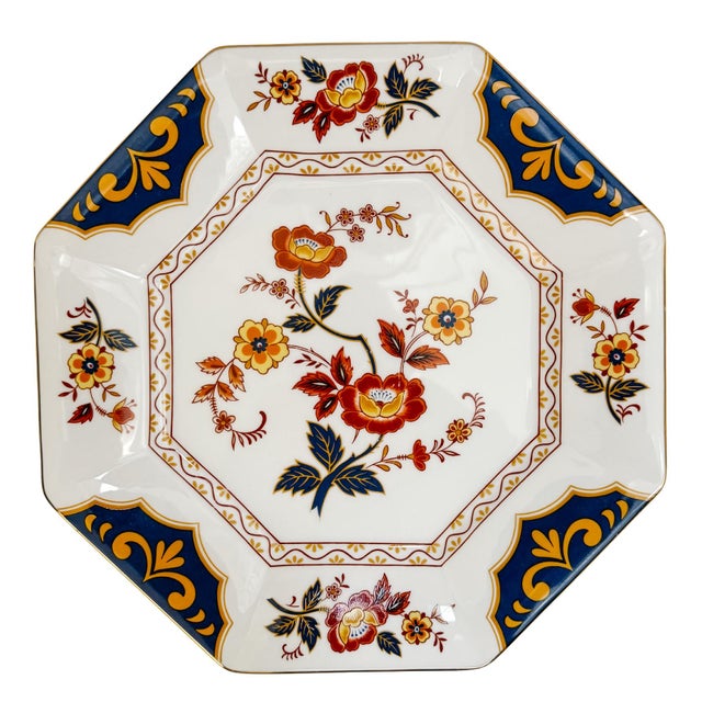 A sophisticated 40-piece vintage dinnerware set by Mikasa features an octagonal silhouette, a hallmark of 1980s high-end...