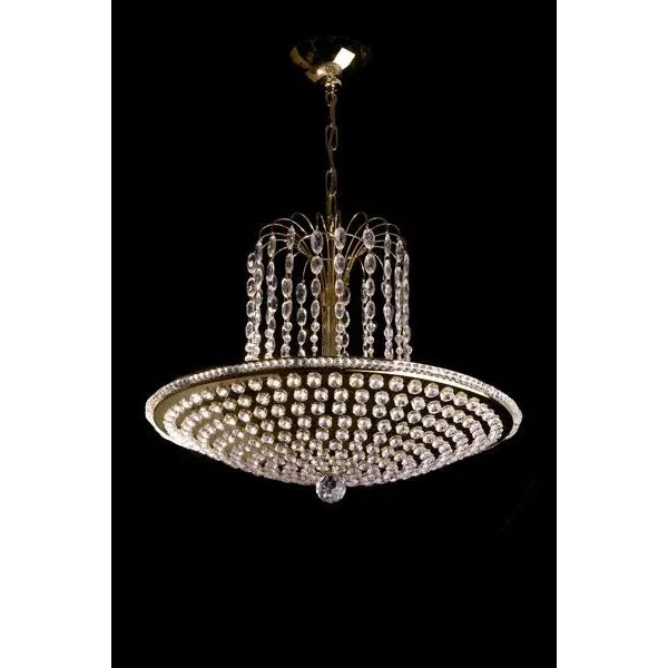 Jeweled crystal pan with cascading teardrop crystals coming off center stem.
