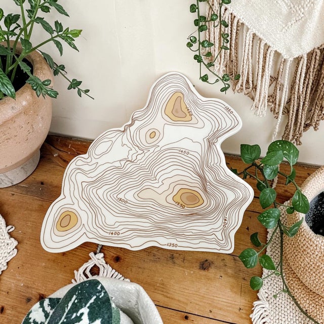 Elevate your entertaining experience with the Topography Cheese Tray by Natalia Janul, a stunning ceramic plate that...