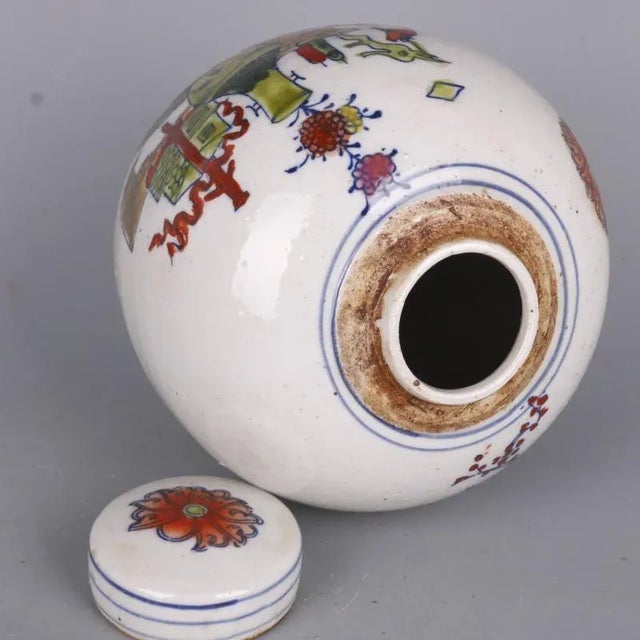 H-cm,W-cm This Chinese vintage Famille Verte porcelain tea jar features intricate hand-painted flowers, showcasing the...