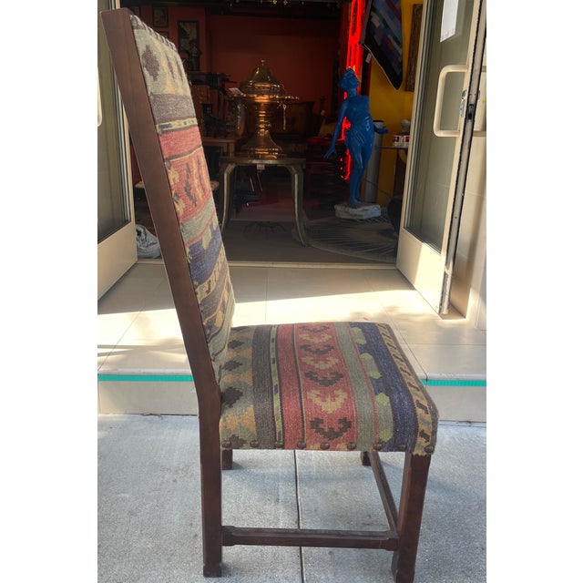 A super solid and traditionally southwestern upholstered. dining chair. The perfect chair for your southwester home!