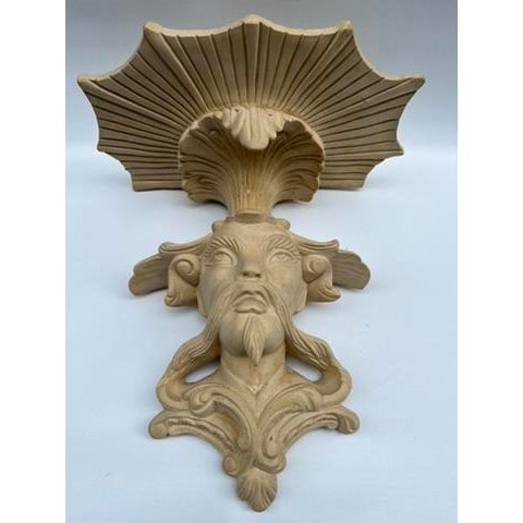 A single vintage chinoiserie style figural wall bracket or shelf with matte finish.