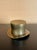 A refined vintage brass wine champagne coaster / holder in the form of a classic top hat, balancing sculptural charm with...