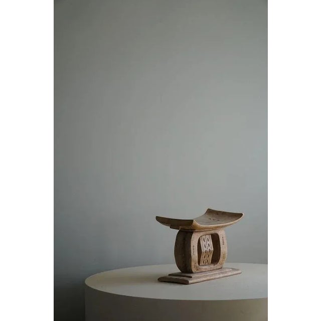 A highly decorative handcrafted Ashanti stool, made in West Africa(Ghana) in the 1970s. A unique design making it a one-...