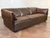1970's Niels Eilersen "Lotus" dark brown leather sofa in good vintage condition, some minor cat scratches and some...