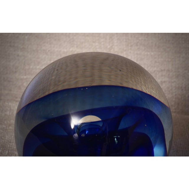 A sphere with internal decorations in various shades of blue and transparent. A sculpture of the highest quality, one of a...