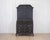 A beautiful 18th century Scandinavian bureau featuring a dramatic black painted finish and refined architectural...